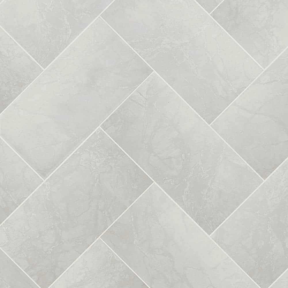Florida Tile Home Collection Michelangelo Calacatta Rectified 12 in. x 24 in. Matte Porcelain Floor and Wall Tile - Zenithce