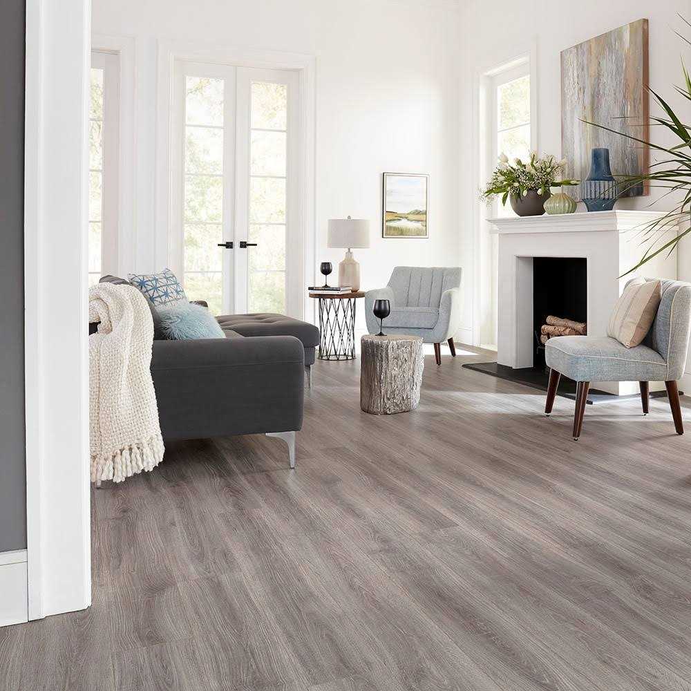 Pergo Portfolio + WetProtect 10-mm T x 7-1/2-in W x 54-in L Waterproof Wood Plank Laminate Flooring - Zenithce